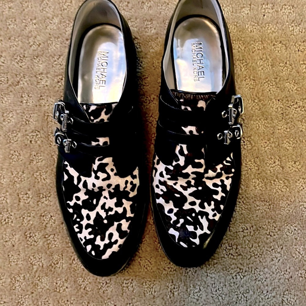 Michael Kors leather flats with black and white calf hair.